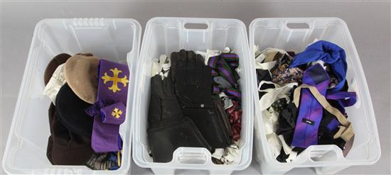 A collection of gentlemens ties, bow ties, flat caps, belts and braces